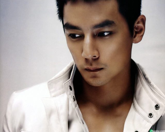 Man white shirt serious staring free wallpaper - medium preview image