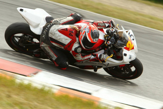 Motorcycle rider race track grass #2 free wallpaper - medium preview image