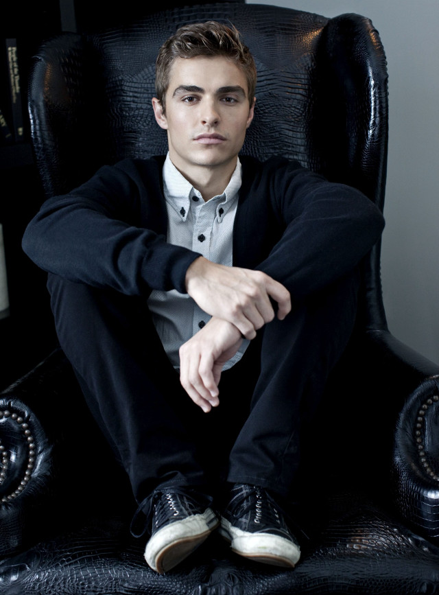 Man sitting chair legs crossed #2 free wallpaper - medium preview image