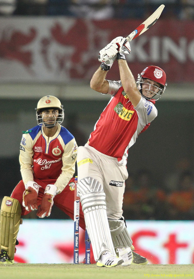 Man swinging bat ball cricket #2 free wallpaper - medium preview image