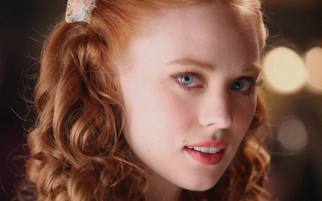 Red hair bow closeup bokeh free wallpaper - medium preview image