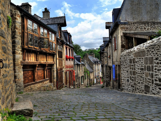 Cobblestone street stone building sign free wallpaper - medium preview image
