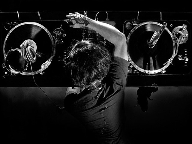 Woman dancing dj turntables dark free wallpaper - medium preview image