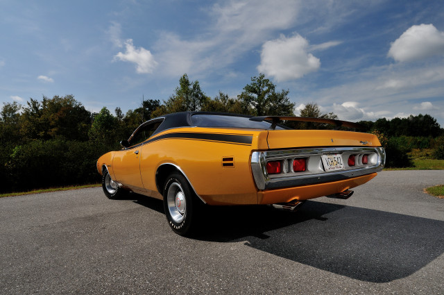 Yellow car parked road sky free wallpaper - medium preview image