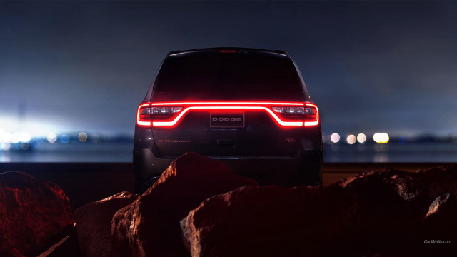 Car parked rocky beach night free wallpaper - medium preview image