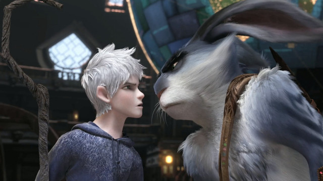 Young boy kissing rabbit rise free wallpaper - medium preview image