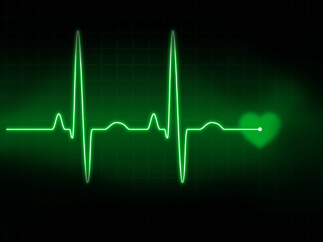 Heartbeat green glow black background free wallpaper - medium preview image