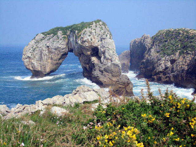 Rock formation ocean arch yellow free wallpaper - medium preview image