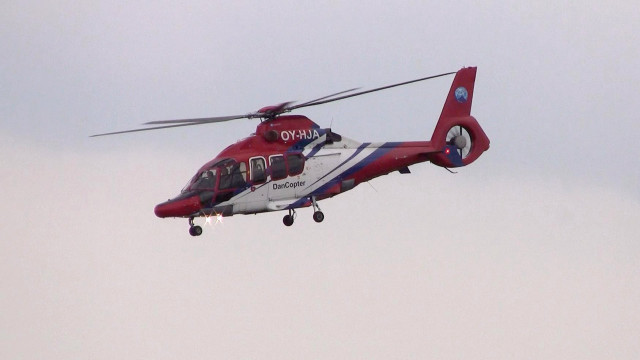 Red white helicopter flying sky free wallpaper - medium preview image