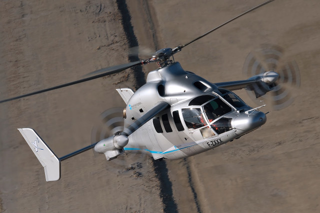 Helicopter flying dirt field forest free wallpaper - medium preview image