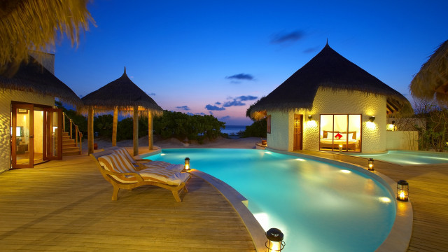 Resort pool ocean night lights free wallpaper - medium preview image