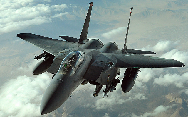 Fighter jet flying clouds mountains free wallpaper - medium preview image