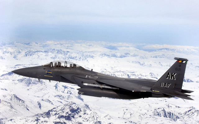 Fighter jet mountain range sky free wallpaper - medium preview image