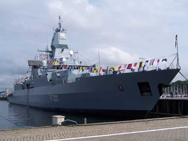 Large gray ship docked pier free wallpaper - medium preview image