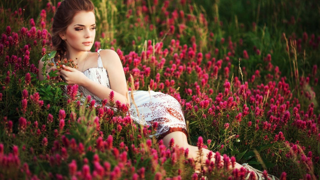 Woman field flowers serious hand free wallpaper - medium preview image