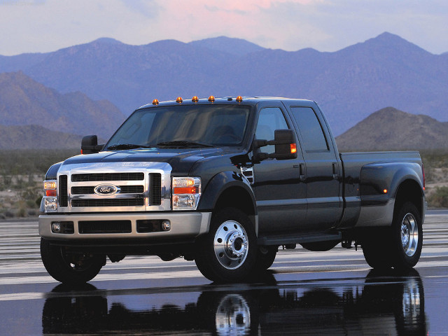 Black truck wet surface mountains free wallpaper - medium preview image