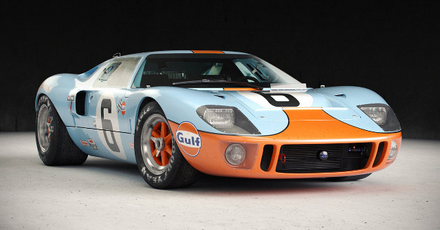 Blue orange race car garage free wallpaper - medium preview image