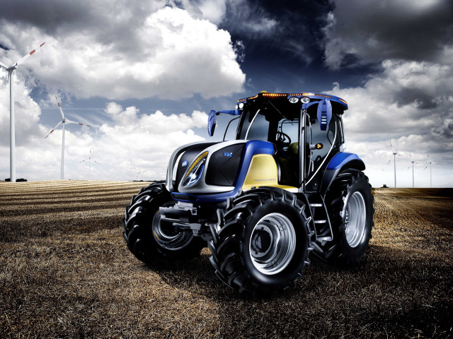 Tractor parked field windmills clouds free wallpaper - medium preview image