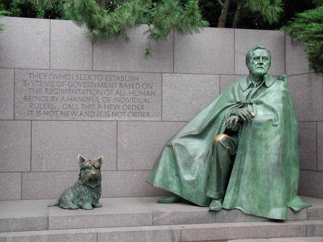 Statue man dog sitting wall free wallpaper - medium preview image