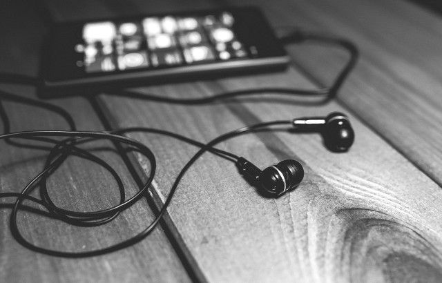 Earbuds wood table phone keyboard free wallpaper - medium preview image