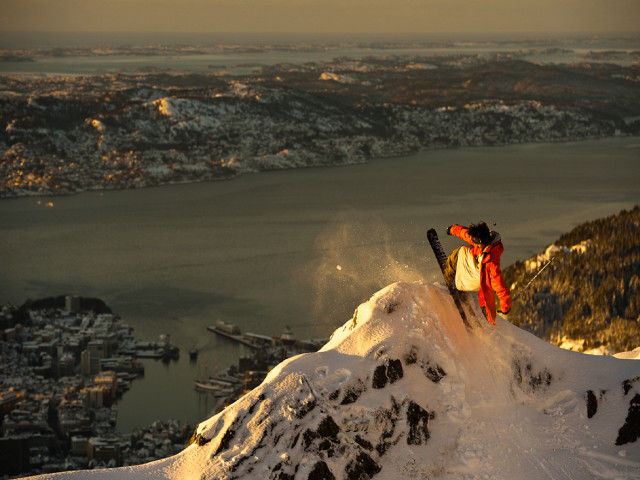 Skiing snowy mountain city lake free wallpaper - medium preview image