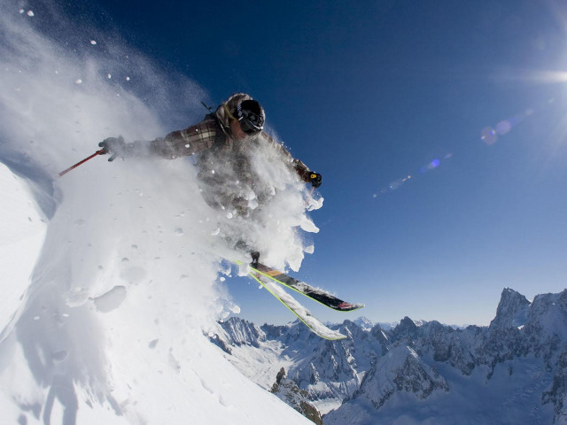 Man flying skis snowy slope free wallpaper - medium preview image