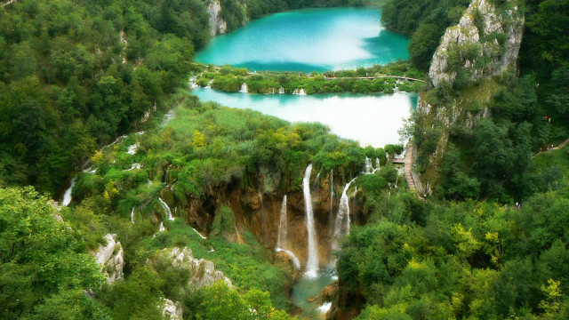 Waterfall lush trees lake cliffs free wallpaper - medium preview image