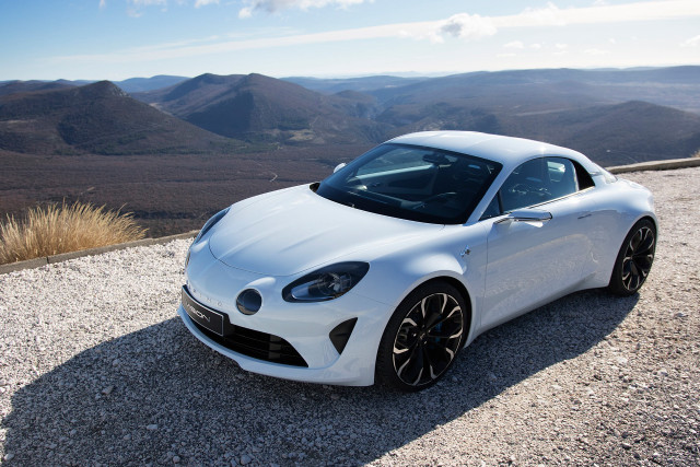 White sports car mountains valley free wallpaper - medium preview image