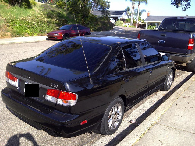 Black car parked road blue free wallpaper - medium preview image