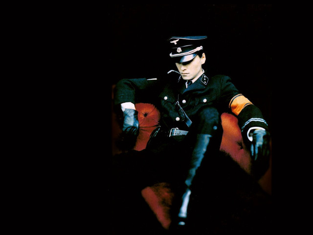 Man uniform chair dark hands free wallpaper - medium preview image