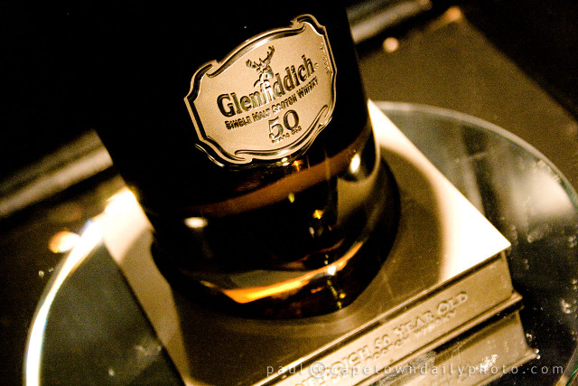 Wine bottle metal stand table free wallpaper - medium preview image