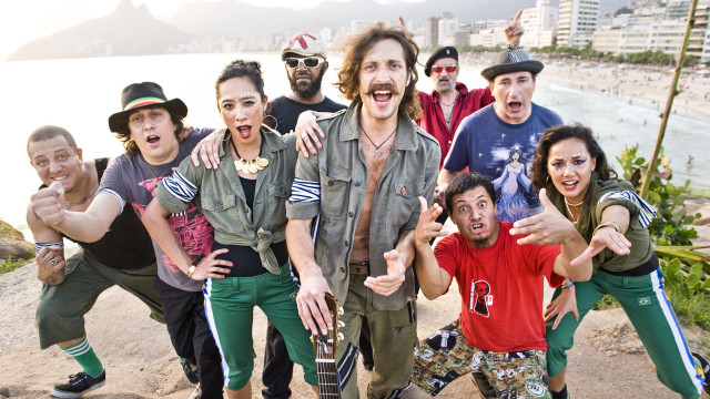 Group posing gun pointing camera free wallpaper - medium preview image