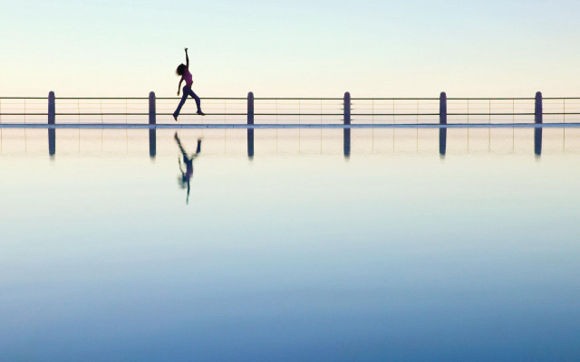 Person walking bridge water fence free wallpaper - medium preview image