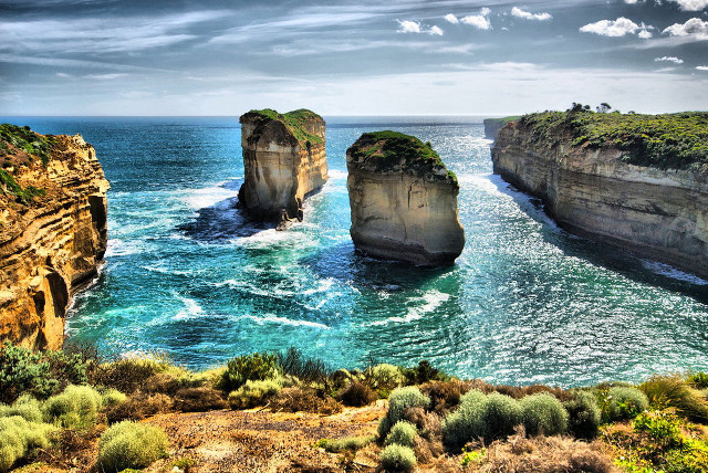 Large water surrounded cliffs beach free wallpaper - medium preview image