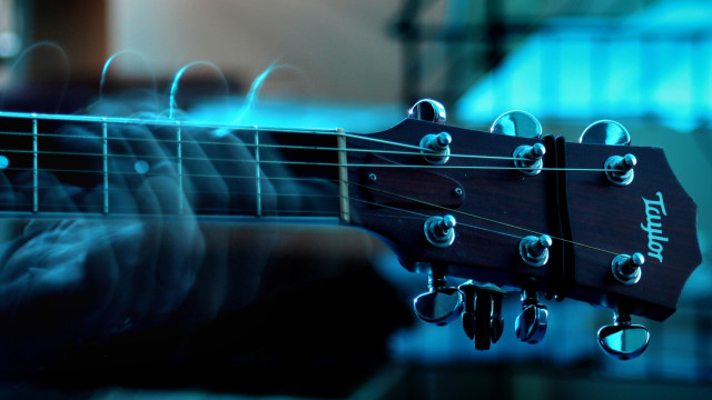 Guitar strings closeup blurry background #2 free wallpaper - medium preview image