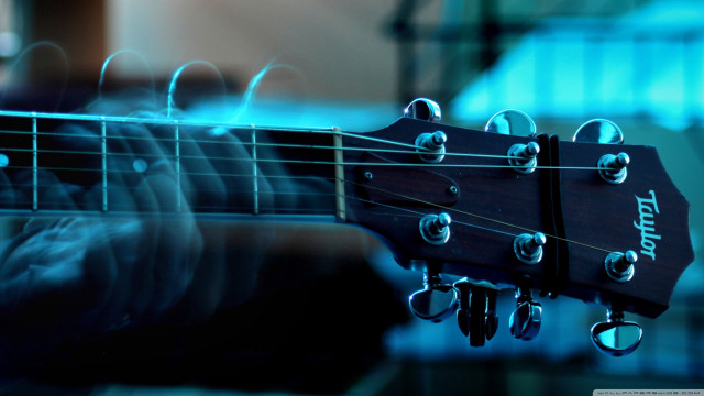Guitar strings closeup blurry background #3 free wallpaper - medium preview image