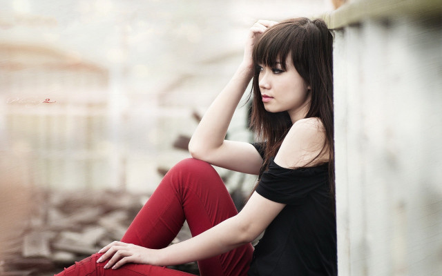 Woman sitting ground legs crossed #10 free wallpaper - medium preview image