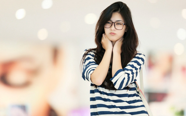 Woman glasses hands face serious free wallpaper - medium preview image