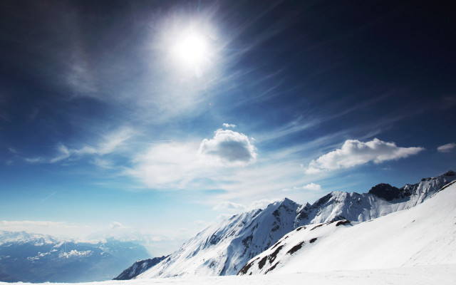 Skiing snowy mountain slope sunny free wallpaper - medium preview image