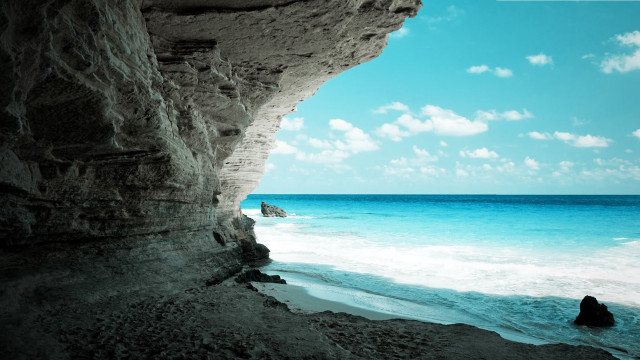 Person rock ocean cliff blue #2 free wallpaper - medium preview image