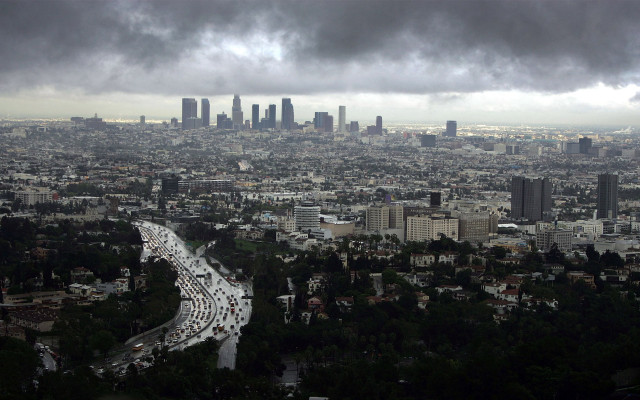 City traffic cloudy sky buildings free wallpaper - medium preview image