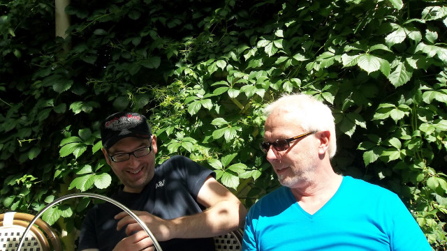 Two men bench bush green free wallpaper - medium preview image
