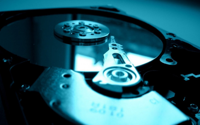 Hard drive closeup blue background free wallpaper - medium preview image
