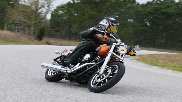 Man motorcycle curvy road forest free wallpaper - medium preview image