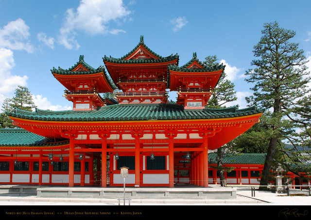 Red building green roof sky free wallpaper - medium preview image