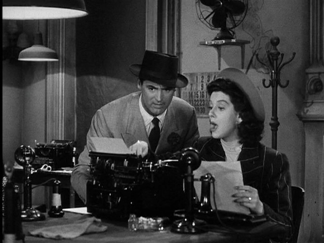 Man woman typewriter room lamp free wallpaper - medium preview image