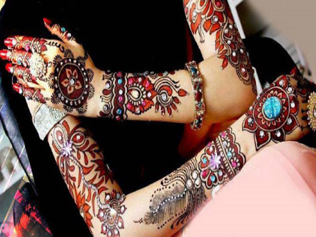 Woman henna tattoos hands feet free wallpaper - medium preview image