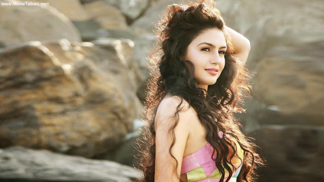Woman long hair rocks wind free wallpaper - medium preview image