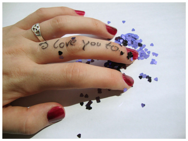 Woman hand ring message confetti free wallpaper - medium preview image