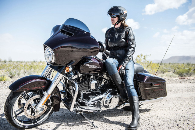 Woman motorcycle dirt road desert free wallpaper - medium preview image
